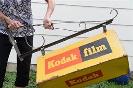 1960's era- tin Kodak hanging film box sign. Box is 2 feet long.