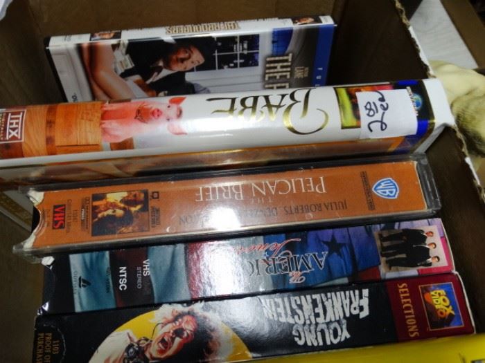 Box of VHS and DVDs