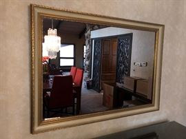 Gold framed wall mirror