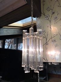 There are 4 of these small chandeliers!