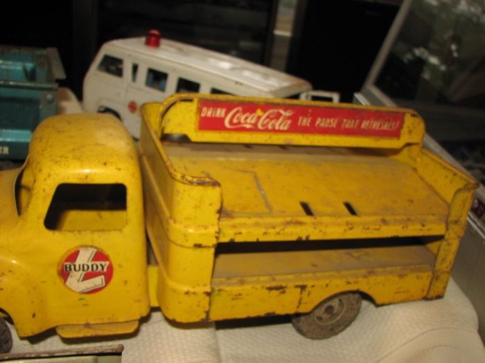 Vintage Tin Litho & Die Cast trucks including Coca Cola (Buddy L) and an ambulance
