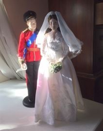 Kate Middleton & Prince William dolls. In the pink bedroom on the second floor.