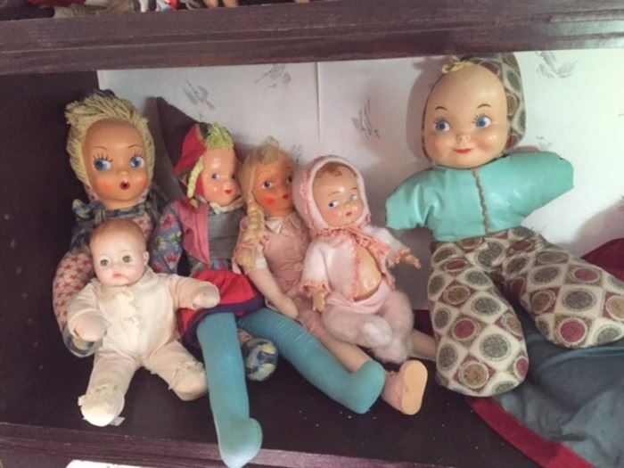 Adorable dolls in need of new homes, in the pink bedroom.
