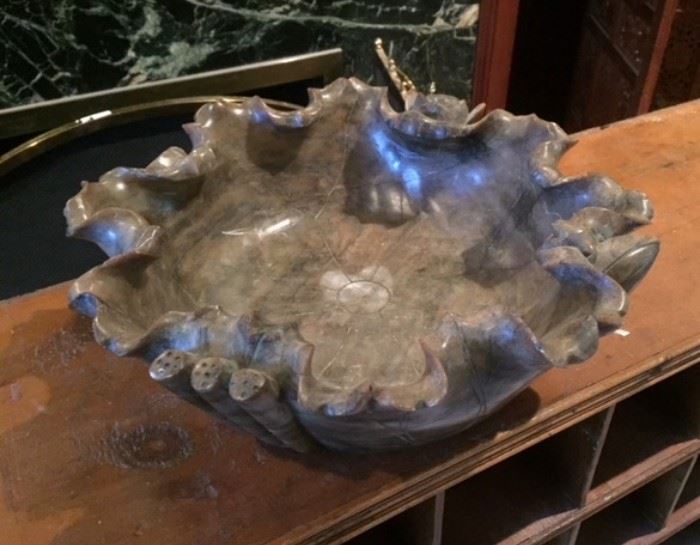 Carved green Chinese soapstone bowl with lotus imagery.  An elegant centerpiece in any room.