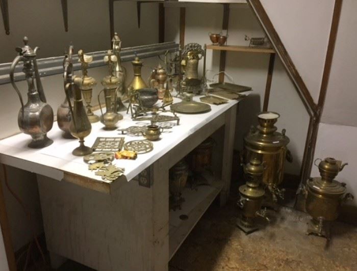 Copper & brass samovars, coffee pots and etc. in the third floor ballroom. 