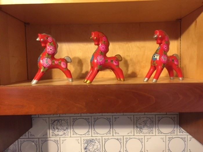 Brightly painted Russian horses. In the kitchen.