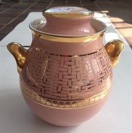 A nice gilt pink cookie jar. In the front pantry.