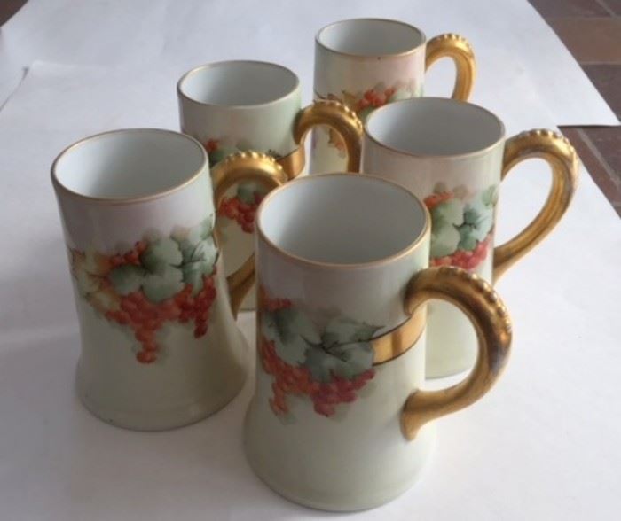 Hand-painted Limoges ceramic mugs. In the front pantry.