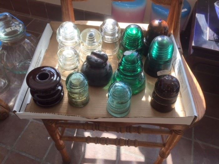 Antique insulators of glass and ceramic. In the sun porch on the first floor. 