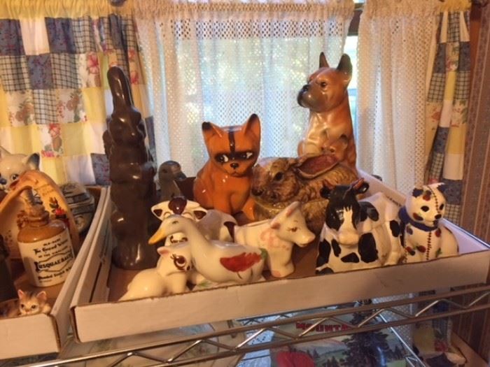 Ceramic menagerie in the kitchen - vintage cows, cats, dugs, cats, dogs, rabbits...and so on.  