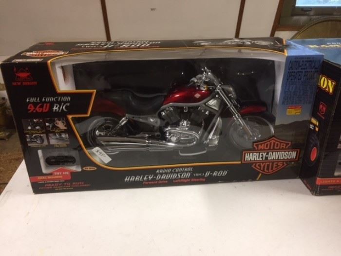 A radio-controlled Harley Davidson toy motorcycle, new in its box. In the third floor ballroom area. 