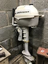 Vintage Johnson Outboard Motor.... so reminiscent of another day and time.  