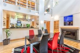 Glass top dining table and leather chairs