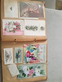 Books and drawers filled with vintage greeting cards