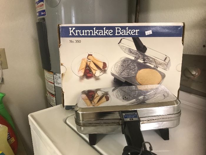 Krumkake baker (pizzelle).  Still works and looks great.