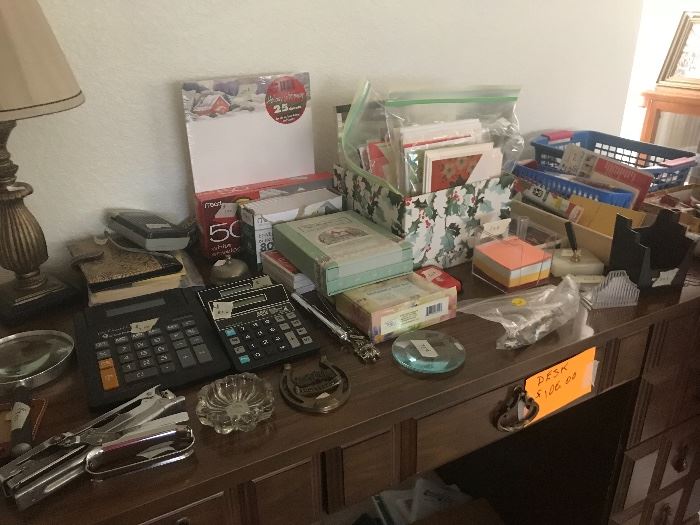 Nice small desk and desk items.