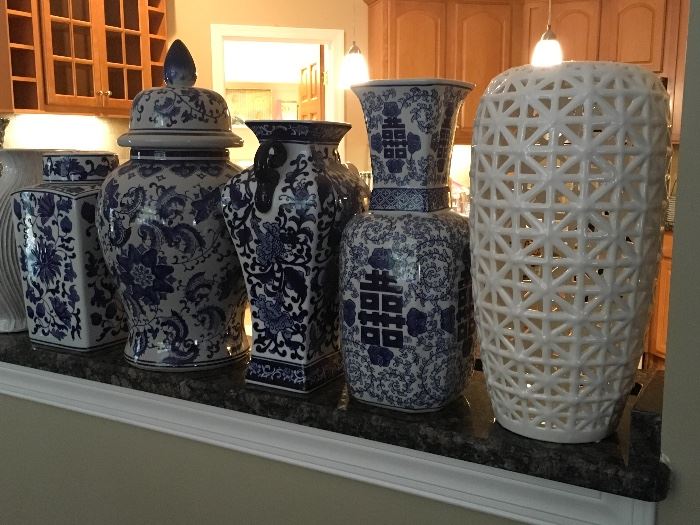 Miscellaneous oriental blue pots and vases.