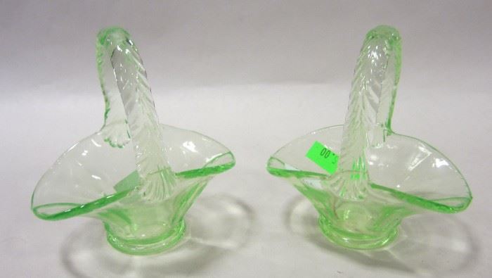 TWO SMALL VASELINE GLASS BASKETS