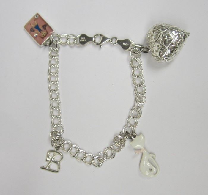  ITALIAN 925 CHARM BRACELET WITH FOUR CHARMS, ALL MARKED 925 ITALY 