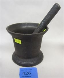 ATIQUE CAST IRON MORTAR AND PESTAL. NUMBER SIGNATURE STAMP ON SIDE. 3 5/8" TALL 
