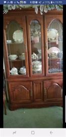 Vintage cherry china cabinet.