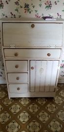 Contemporary drop front desk with original finish of distressed white paint.  Very nice size with lots of usuable space.