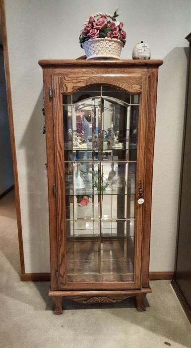 We have two of these curio cabinets