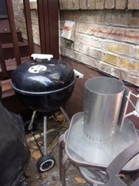 Weber grill. Two small metal/glass tables.