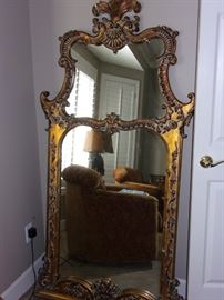 Stunning double mirror with gold accent, wood frame.