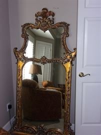 Stunning double mirror with gold accent, wood frame.
