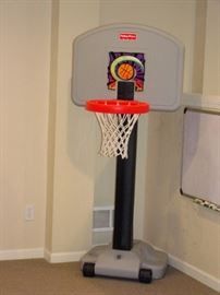 Fisher Price portable basketball hoop, in like new condition.