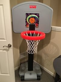 Fisher Price portable basketball hoop, in like new condition.