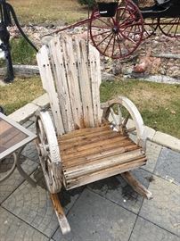 Adirondack chair with wheel armrests