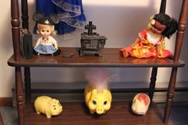 piggy bank collection and vintage Disney dolls
