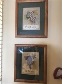 Wine themed prints in wooden frames. 