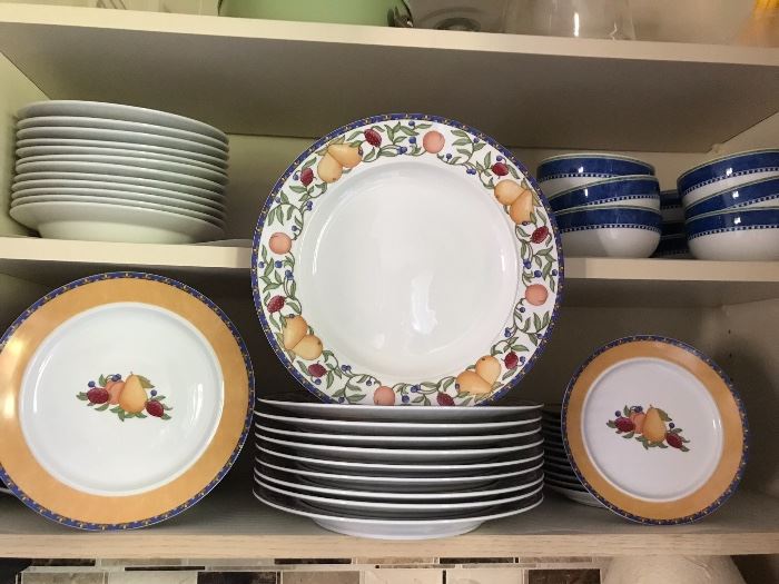 Large set of dishes with fruit motif. 