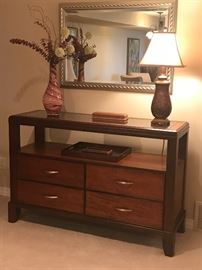 Entrance table with glass top. Beautifully designed storage. 