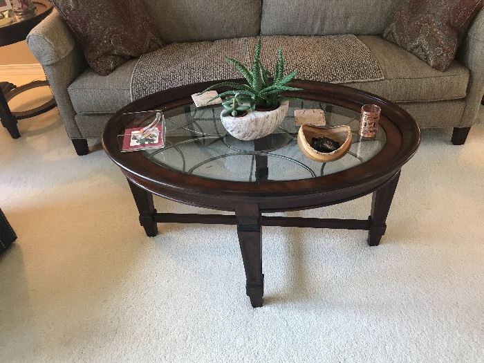 Coffee table with glass top. 