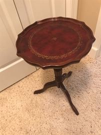 Vintage end table with leather embossed top, cherry wood. 