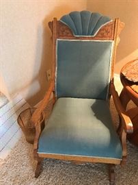 Intricately carved antique rocking chair. 