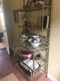 Modern wrought iron stand with glass shelves 