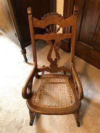 Child’s Eastlake rocker, with some damage