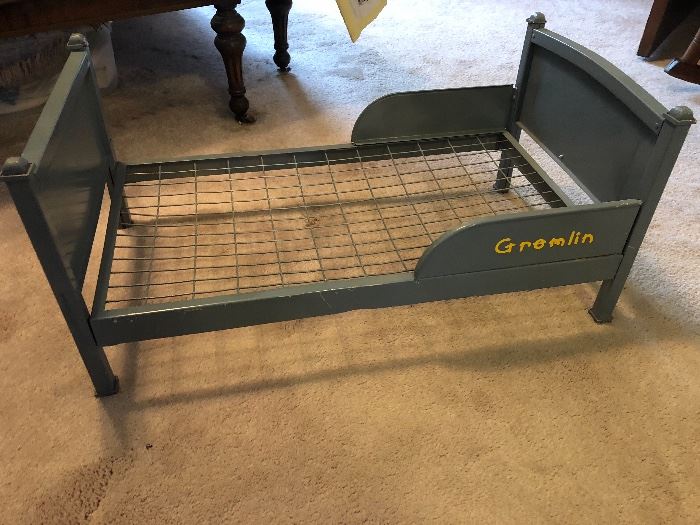 Antique toy metal bed.