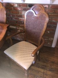 Wicker back vintage chairs (part of dining room set)...