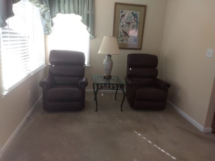pair of leather recliners