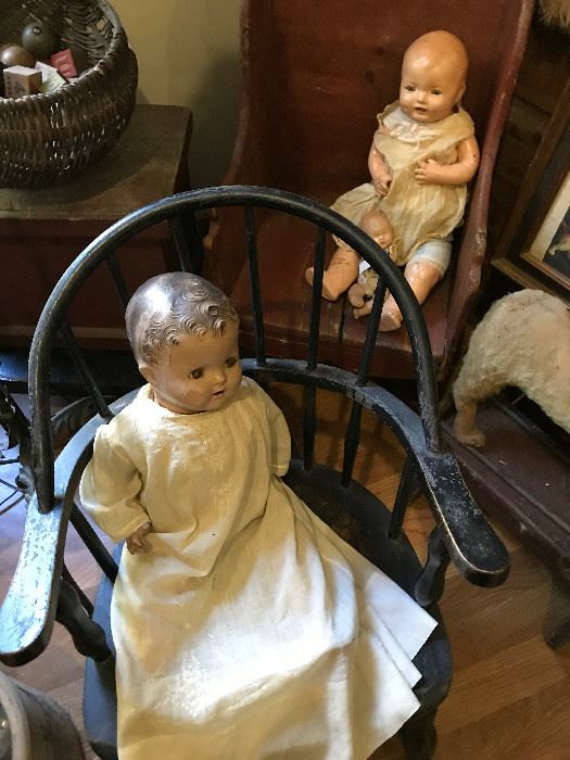 Antique dolls, children's chairs