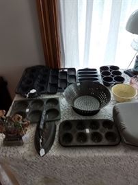 Cast iron muffin pans, iron, door stop.