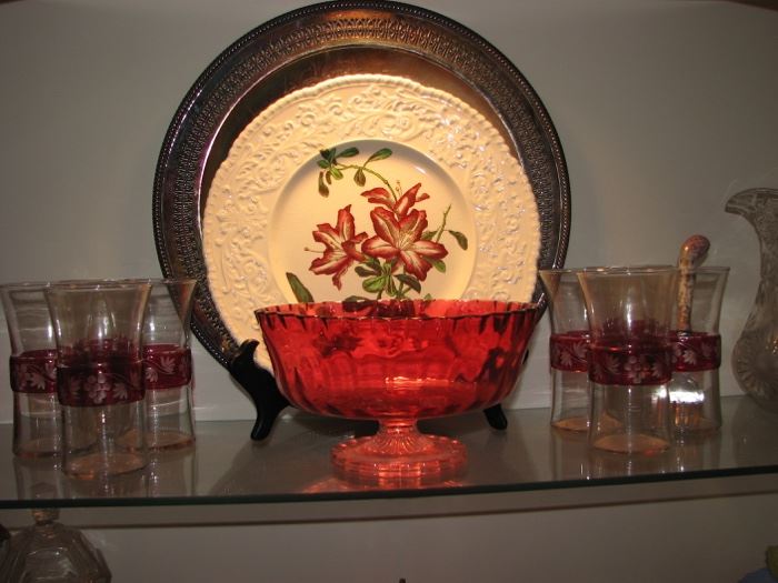 Cranberry glass pedestal bowl, cut-to-clear glasses