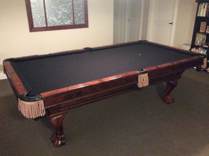 Nice Pool Table with black felt top. By: Schmidt