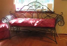 Metal bench with cushion